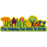 The words Thank You are made from a tree, grass, pumpkins, a birdhouse and flowers.