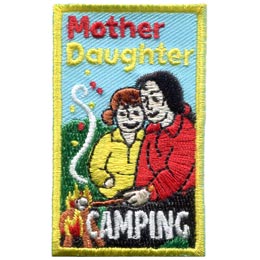 A mother and daughter roast a marshmallow over a fire. The words Mother Daughter Camping frame them.