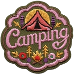 A pink tent above the word Camping and a small campfire.