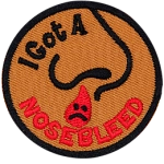 The words I Got A Nosebleed are around a nose with a drip of blood. The drip of blood has a frowny face.