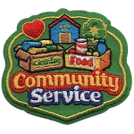The words Community Service are beneath a house and two boxes of food.