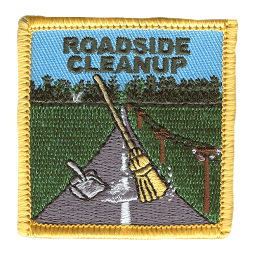 The words Roadside Clean Up are at the top of the patch. A broom sweeps the road, fading into the horizon.