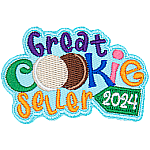 The words Great Cookie Seller have the two Os in Cookie replaced with cookies. There is a tag with the date 2024 on Seller.