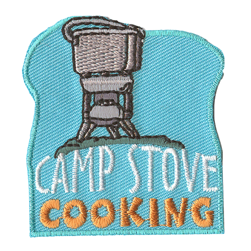 A metal camp stove with a pot on it. The words Camp Stove Cooking are underneath.