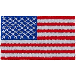 A red and white striped flag. In the top left is a blue box with 50 stars.