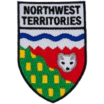 The Northwest Territories flag underneath the words Northwest Territories in the shape of a shield.