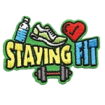 The words Staying Fit are surrounded by a sneaker, water bottle and dumbbell