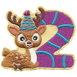 A little fawn, wearing a party hat, lays beside the number 2.