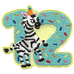 A happy zebra rears up in front of a sprinkle-coved number 12.