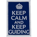 The words Keep Calm And Keep Guiding on a blue background.