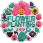 The words Flower Planting are surrounded by flowers and gardening tools.