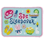 A bunch of spa supplies surrounding the words Spa Sleepover.