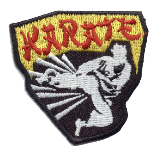 The white silhouette of a karate student wearing a gi kicks out. The word Karate is written in red stylized letters at the top.