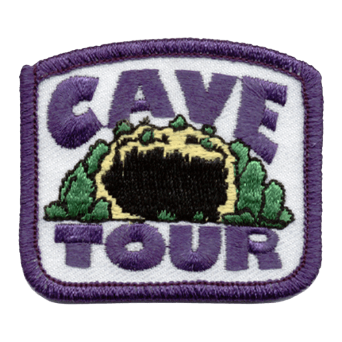 The open maw of a cave surrounded by trees. The words Cave Tour are above and below.