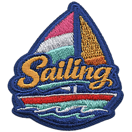 A colourful boat on the water with the word Sailing across it.
