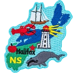 This crest is shaped like the province of Nova Scotia. Decorating it are the initials NS, a lobster, a lighthouse, an apple, a whale, a sailing ship, the ocean, and the capital city Halifax.