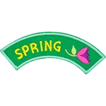 This rounded rocker has the word Spring followed by a tulip flower.