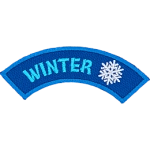 This rounded rocker has the word Winter followed by a snowflake.