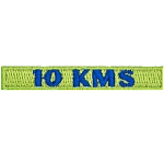 The number 10 KMS is stitched in blue on a green patch.