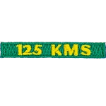 The number 125 KMS are stitched in yellow on a green background.