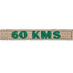 The number 60 KMS is stitched in green on a cream-coloured background.
