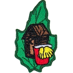 An outhouse, a red bucket and two yellow gloves are on a green leaf.