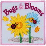A yellow and blue flower has a ladybug on them. The words Bugs & Blooms are across the top. Two yellow butterflies are to the side.