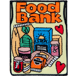 The words Food Bank are above a group of nonperishables and two red hearts.