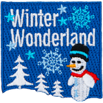 A snowperson in a winter wonderland with snow-covered trees. 
