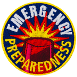 A red alarm light with the words Emergency Preparedness stitched in a circle around it.