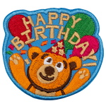 A happy bear shouts the words Happy Birthday.