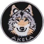 A wolf head with the word Akela below it.