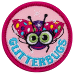 A sparkling ladybug with cartoon eyes and multicoloured spots. The word Glitterbugs is across the bottom.