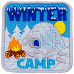 An igloo sits next to a campfire in a field of snow, symbolizing a winter camp.