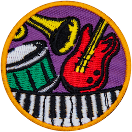 A guitar, piano, drum and trumpet on a circle patch.