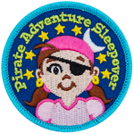 A young girl with an eyepatch and a bandana on. The words Pirate Adventure Sleepover are in an arch above her head.