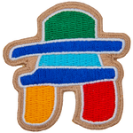 This inukshuk statue-shaped laser-cut crest displays a variety of colours.