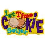 The words 1st Time Cookie Seller are surrounded by yellow. The Os in cookie are replaced by two cookies.