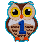 An owl displays the number 1 on its chest to symbolize the first-year achievement.