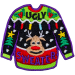 An ugly Christmas sweater with a reindeer face on it and the words Ugly Sweater stitched into the top and bottom.