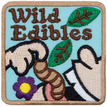 A mouth eating a tuber under the words Wild Edibles.