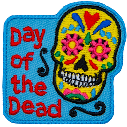 The words Day Of The Dead are next to a Calaveras.