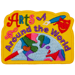 The words Arts Around The World surround a painted globe. A pen, paintbrush, music notes and thalia are scattered across the empty spaces.