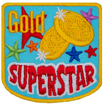 Two gold star medals are placed among different colour stars. The words Gold Superstar is embroidered on this patch.