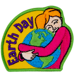 A woman is shown hugging the Earth. The words Earth Day are across the left.