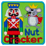 A nutcracker and the rat king above the words Nut Cracker. 
