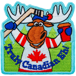 An anthropomorphic moose in a maple leaf jersey holds a hockey stick and coffee cup. The words Truly Canadian Eh! are across the bottom.