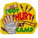 The words I Got Hurt At Camp are next to a bandaged hand.