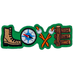 The word Love is spelt with a boot, compass, two marshmallow sticks, and a fence post.