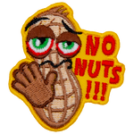 A peanut holds out its hand in a stop gesture. The text on the right side of the patch reads, No Nuts!!!
